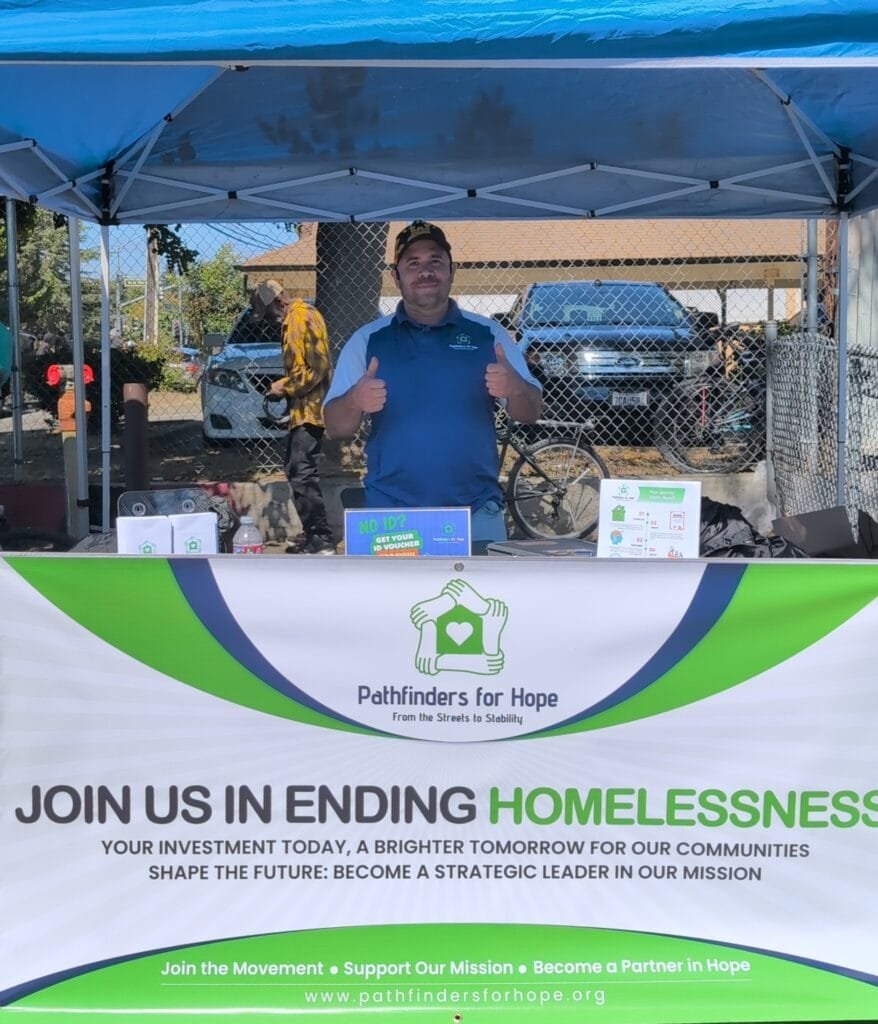 Marco, founder of Pathfinders for Hope, at a local resource fair in Vallejo helping unsheltered residents join the Stability Navigation Program.